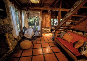 Classic Cabin (CABAÑA ANDINA) | Living area | 32-inch LCD TV with satellite channels, TV, fireplace