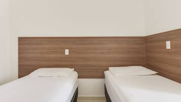Quarto duplo | Frigobar, Wi-Fi de cortesia, roupa de cama