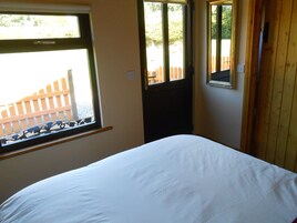 Quarto casal, vista para o jardim