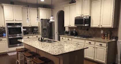 1 exit away from Masters & all entertainment near Washington Rd.