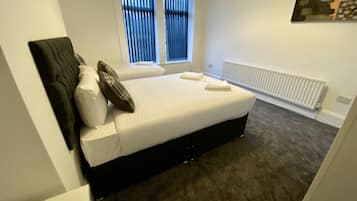 Egyptian cotton sheets, premium bedding, down duvets, memory-foam beds