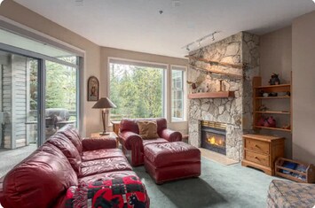 Main living room with Mtn Views and gas fireplace