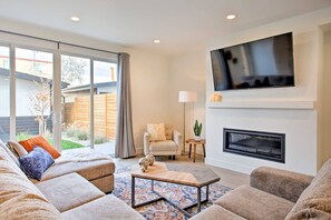 U shaped sofa and 65 inch smart tv
