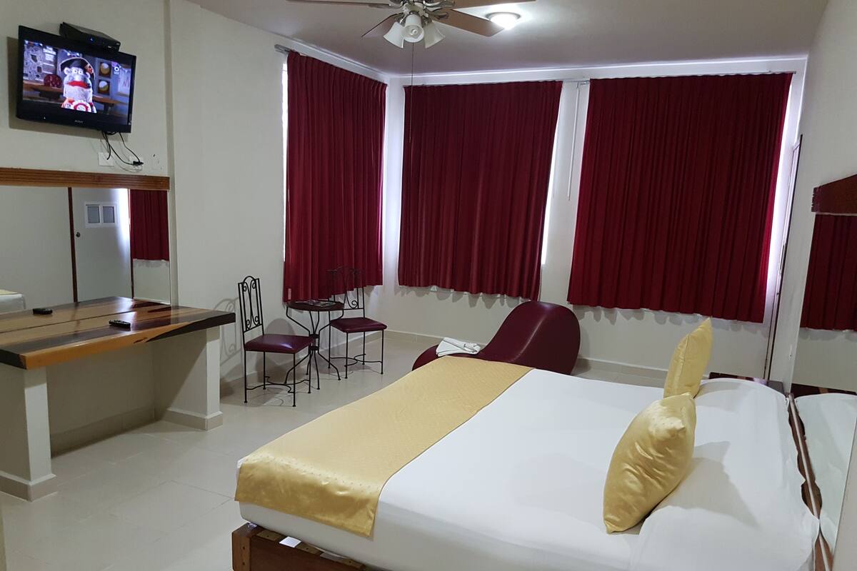 Blackout curtains, iron/ironing board, free WiFi, bed sheets