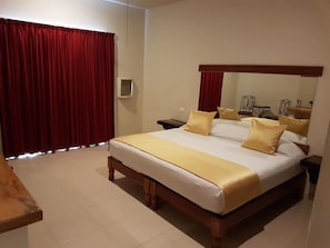 Blackout curtains, iron/ironing board, free WiFi, bed sheets