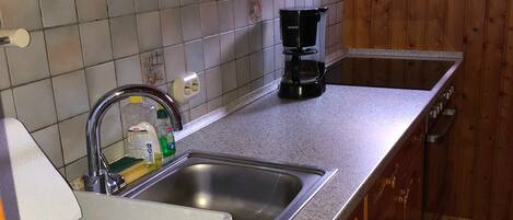 Fridge, microwave, oven, high chair