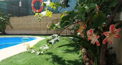 House with a pool, private spa, and hot tub