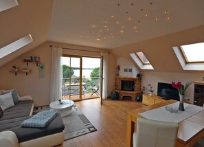 TV, fireplace - Vacation apartment Lange with a view of the Schmollensee - Ferienwohnung Lange (Heringsdorf)