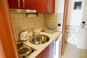 Quarto triplo panorâmico, 1 quarto, vista para o mar | Cozinha americana privada
