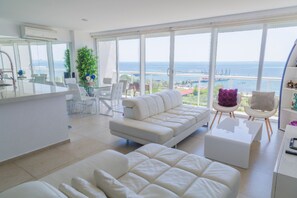 Apartment | Living area | Flat-screen TV - MARINA Beachfront 2 BDR- Amazing Oceanview (Cancun)