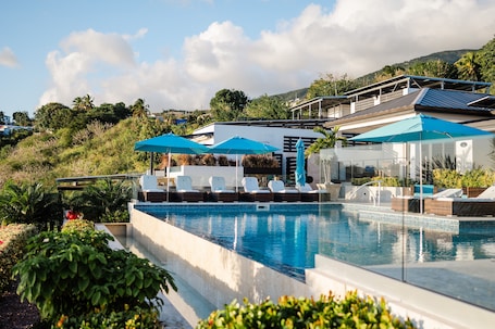 Outdoor pool, pool umbrellas, sun loungers