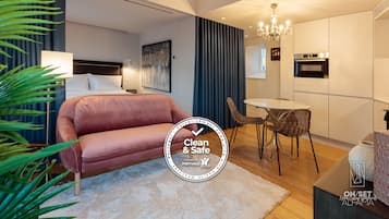 Panoramic Apartment, 1 Bedroom | Living area | 42-inch Smart TV with cable channels, TV