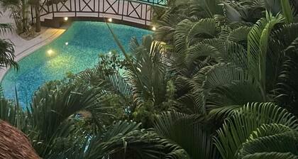 5 minutes to the beach! Family penthouse condo with private rooftop & decks