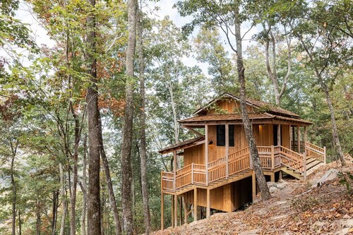 Japanese timberframe tiny house perched on side of Lookout Mountain