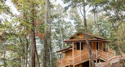Japanese timberframe tiny house perched on side of Lookout Mountain
