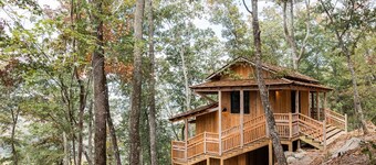 Japanese timberframe tiny house perched on side of Lookout Mountain