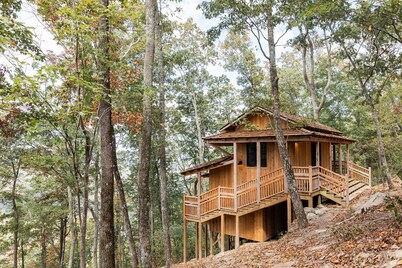 Japanese timberframe tiny house perched on side of Lookout Mountain