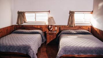Comfort Quadruple Room | Minibar, individually furnished, blackout drapes, free WiFi