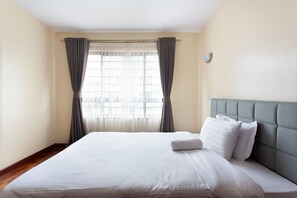 3 chambres, coffres-forts dans les chambres, fer et planche à repasser