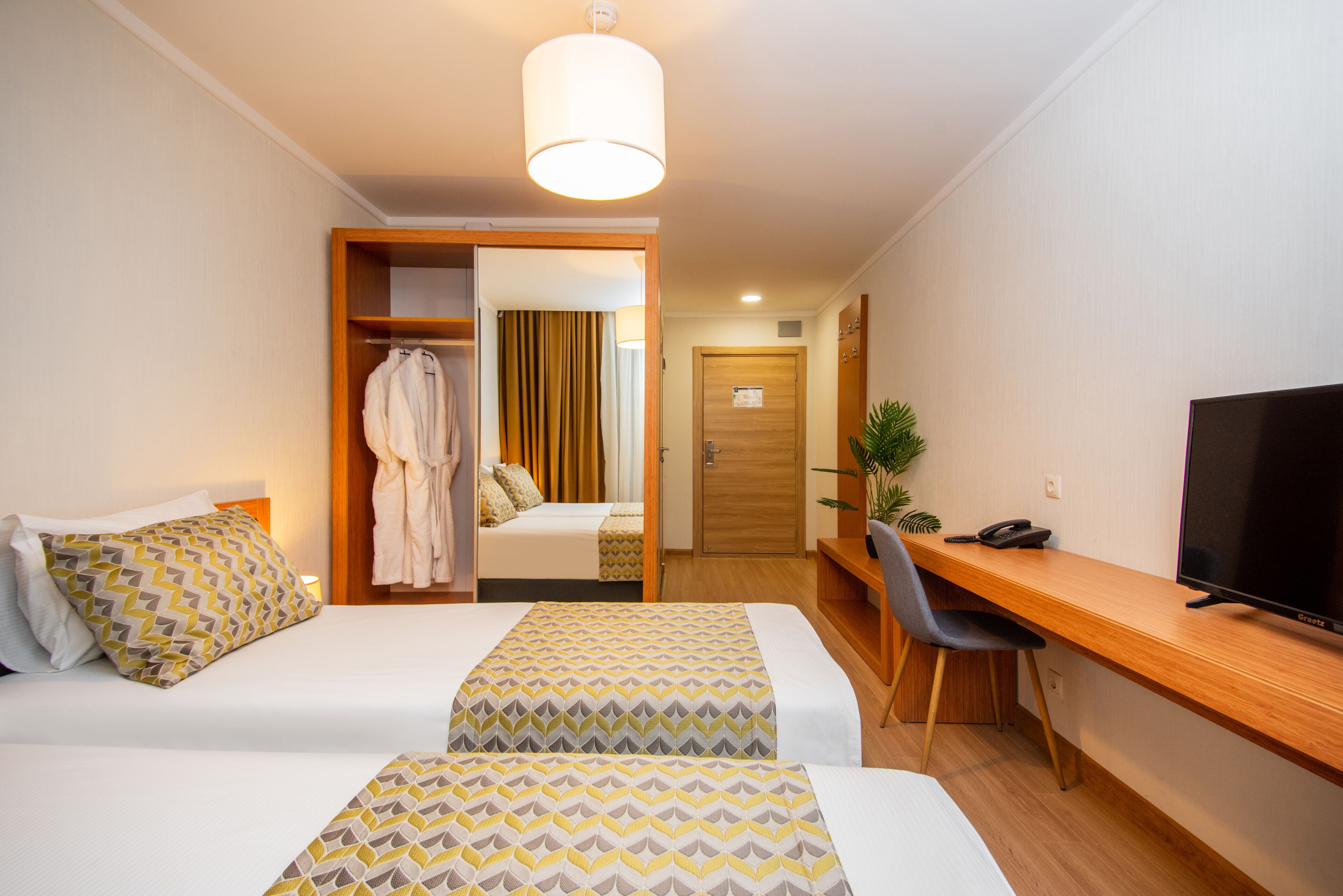 Chambre Standard avec lits jumeaux | Rideaux occultants, Wi-Fi gratuit, draps fournis