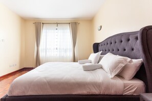 3 chambres, coffres-forts dans les chambres, fer et planche à repasser