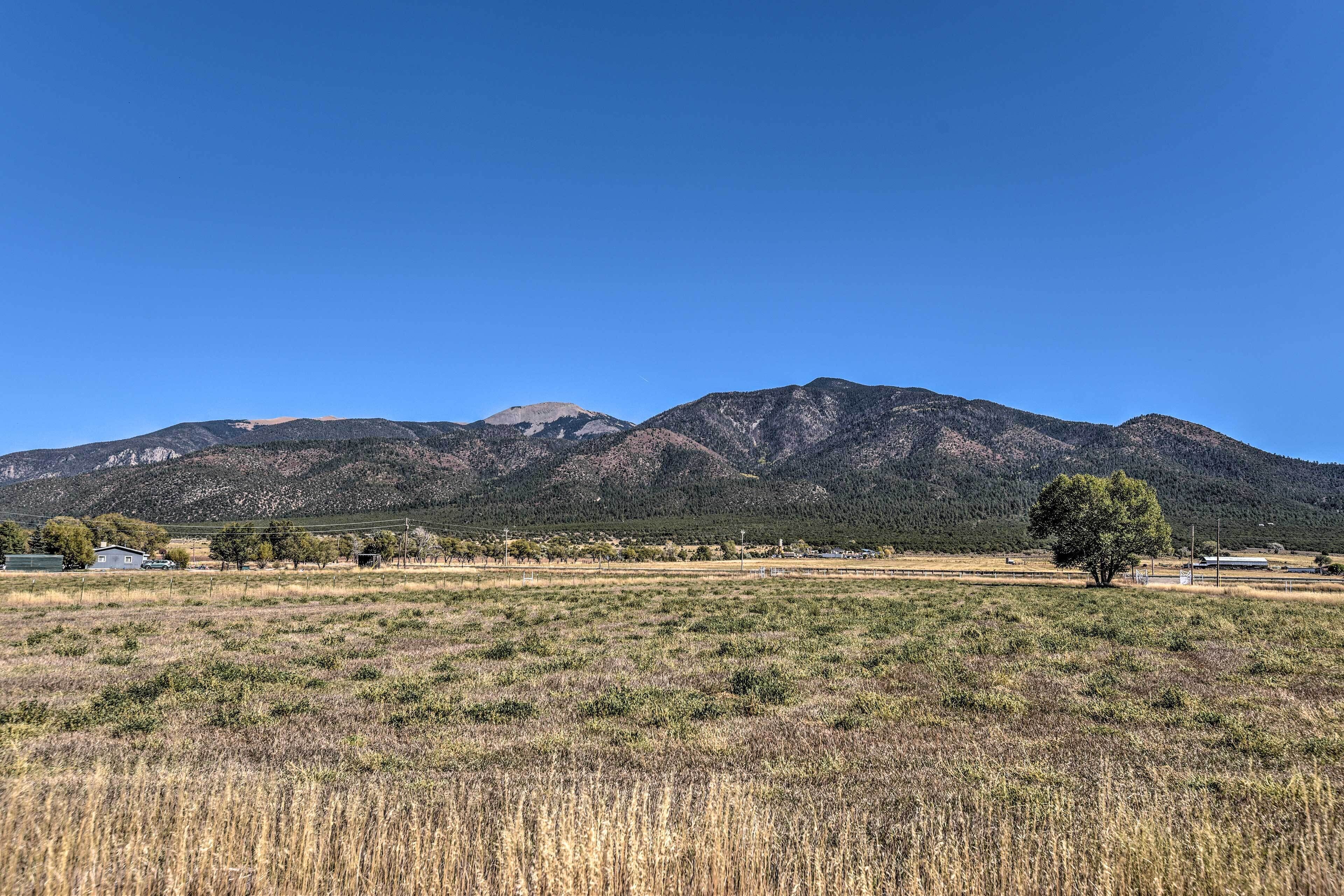 A mountainous landscape with a clear sky.