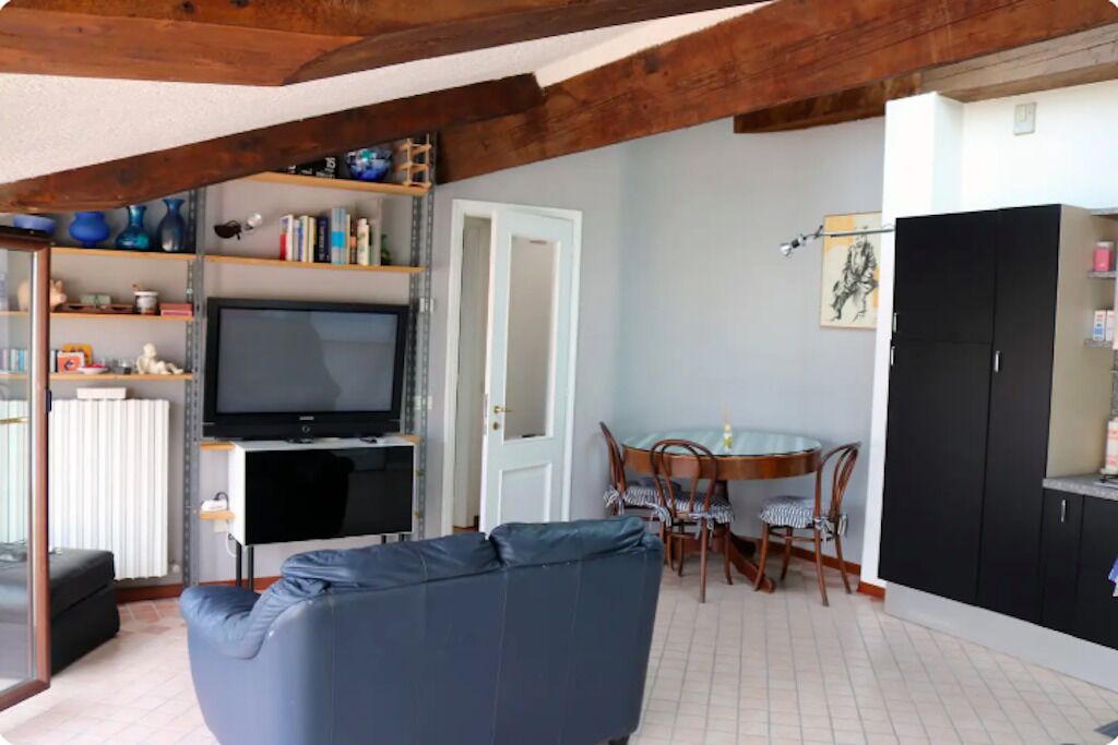 Corte Cavour. An attic in the heart of the city