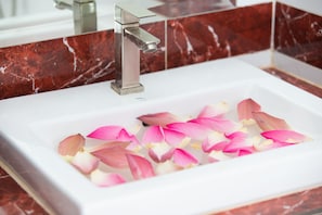 Shower, free toiletries, slippers, towels
