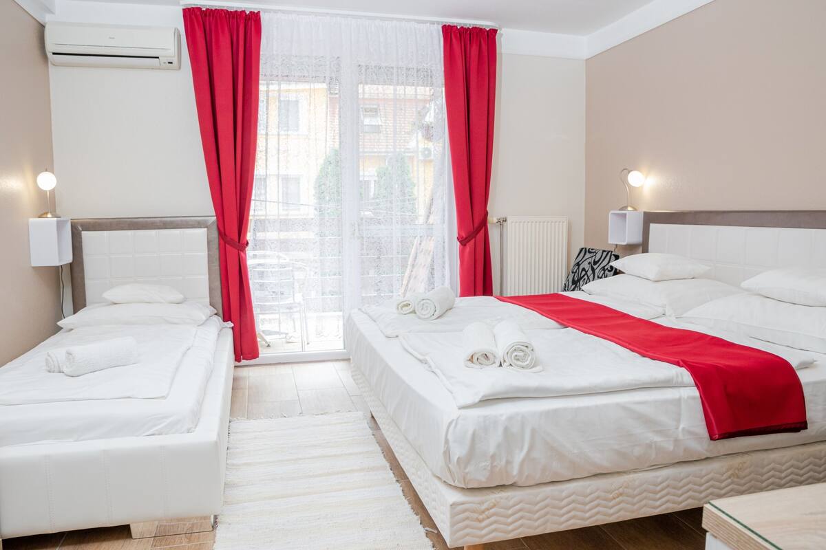 Premium bedding, memory-foam beds, in-room safe, desk