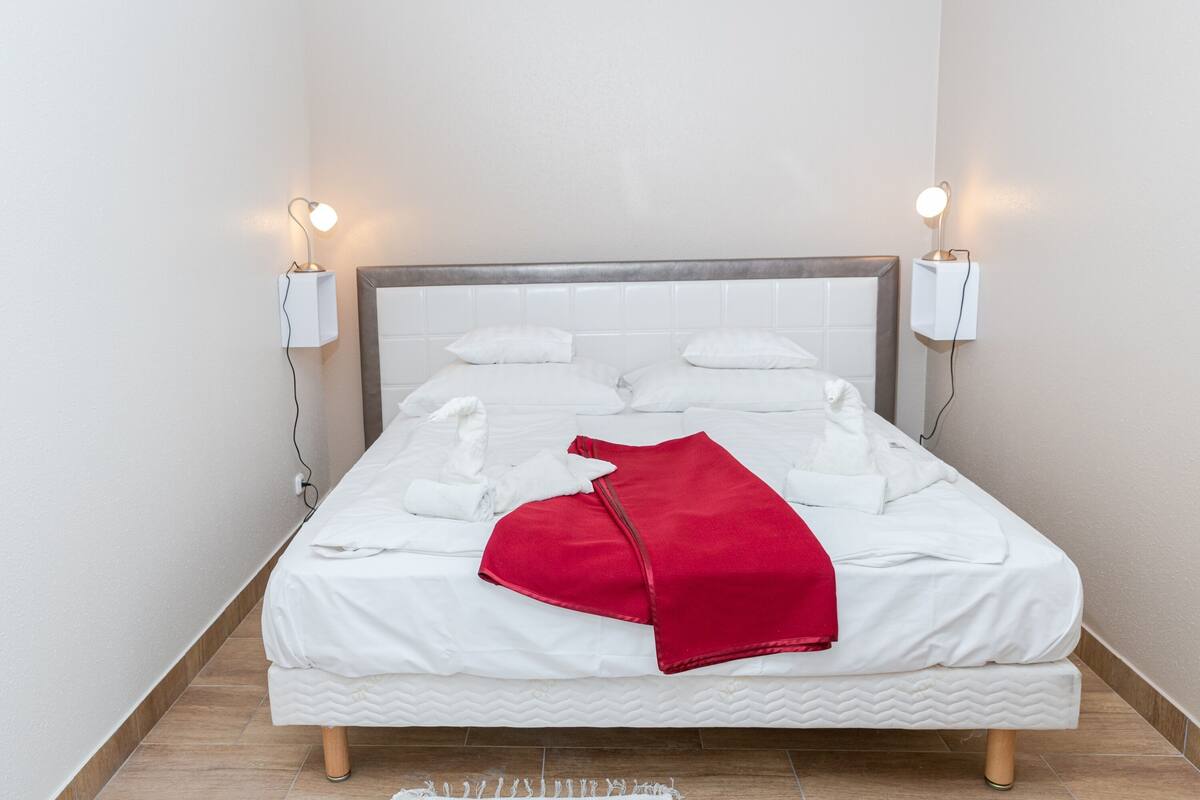 Premium bedding, memory-foam beds, in-room safe, desk