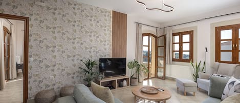 Smart TV, chimenea, videojuegos, libros