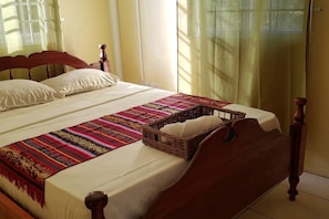 1 bedroom, desk, iron/ironing board, travel crib