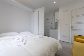 Egyptian cotton sheets, premium bedding, desk, laptop workspace