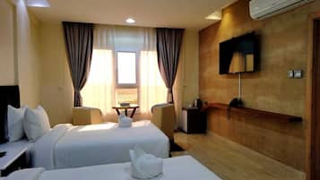 Chambre Deluxe avec lits jumeaux | Chambres insonorisées, Wi-Fi gratuit, draps fournis