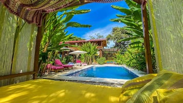 Outdoor pool, free cabanas, pool umbrellas