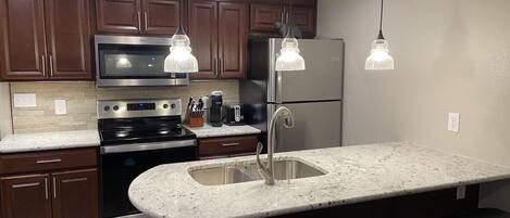 Fridge, microwave, oven, stovetop