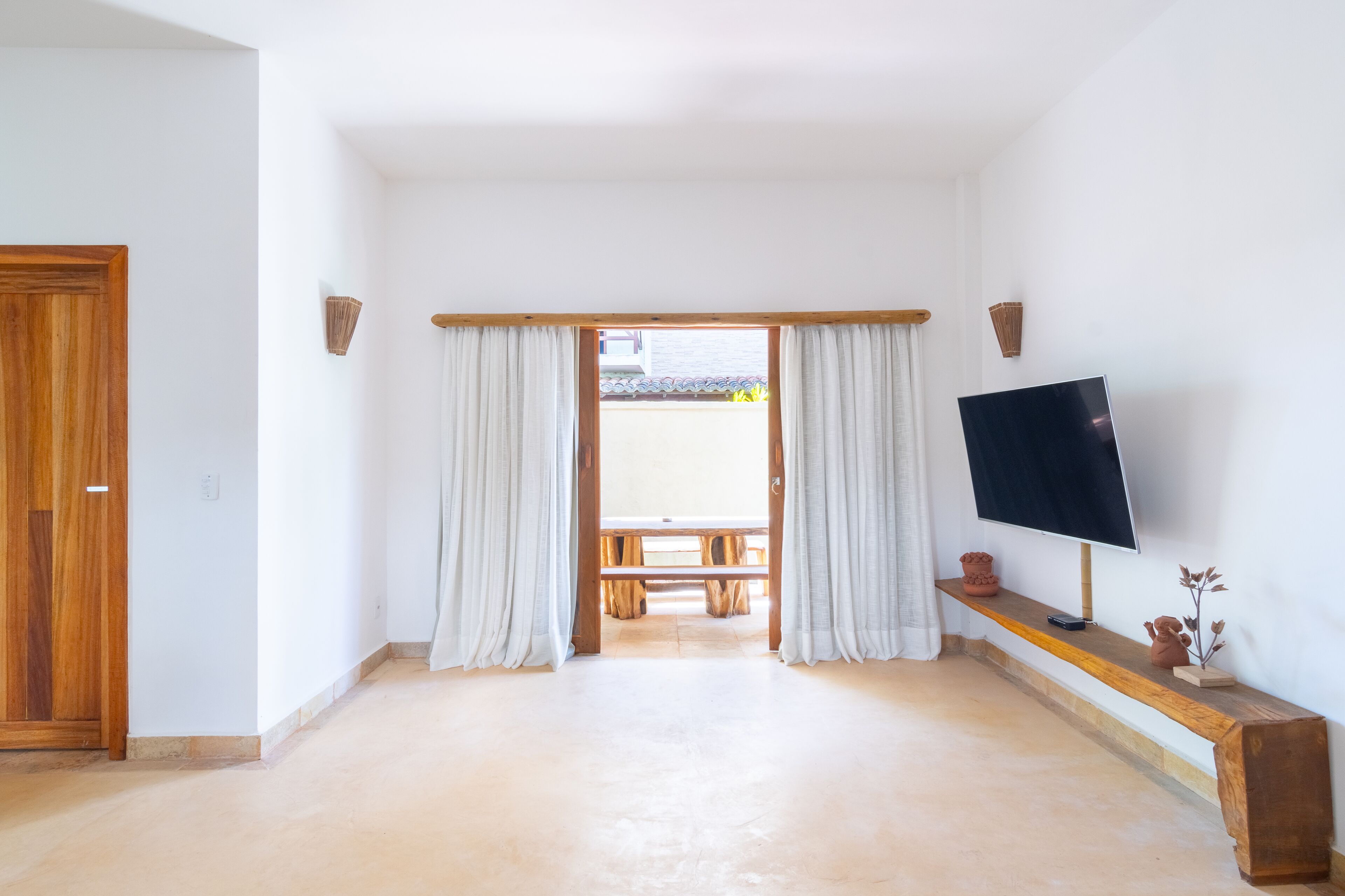 house (carambola) | living area | flat-screen tv