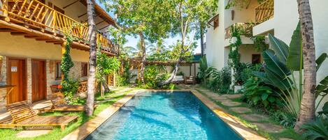 Outdoor pool, open 9:00 AM to 9:00 PM, pool loungers