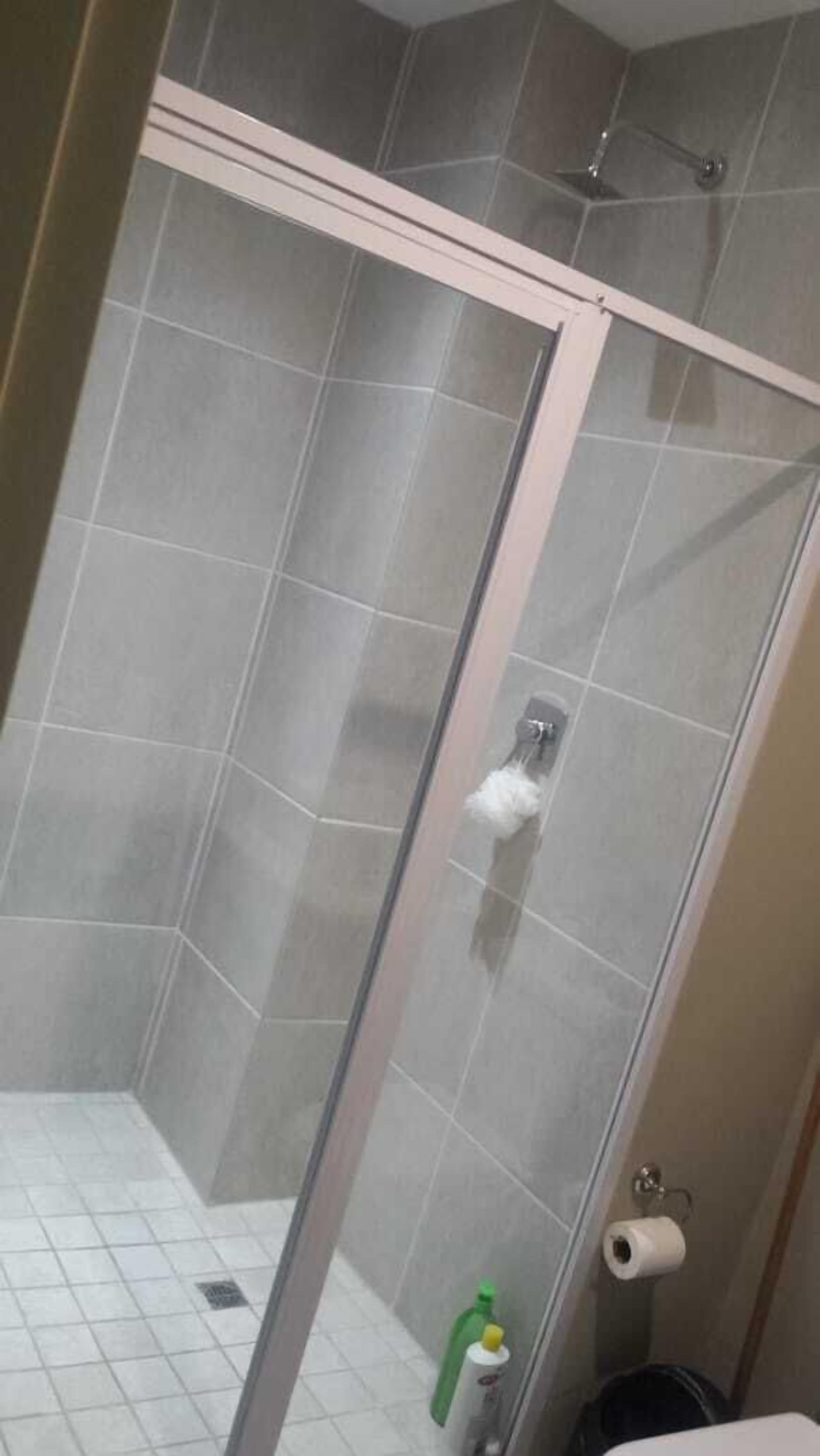 Separate tub and shower, rainfall showerhead, free toiletries