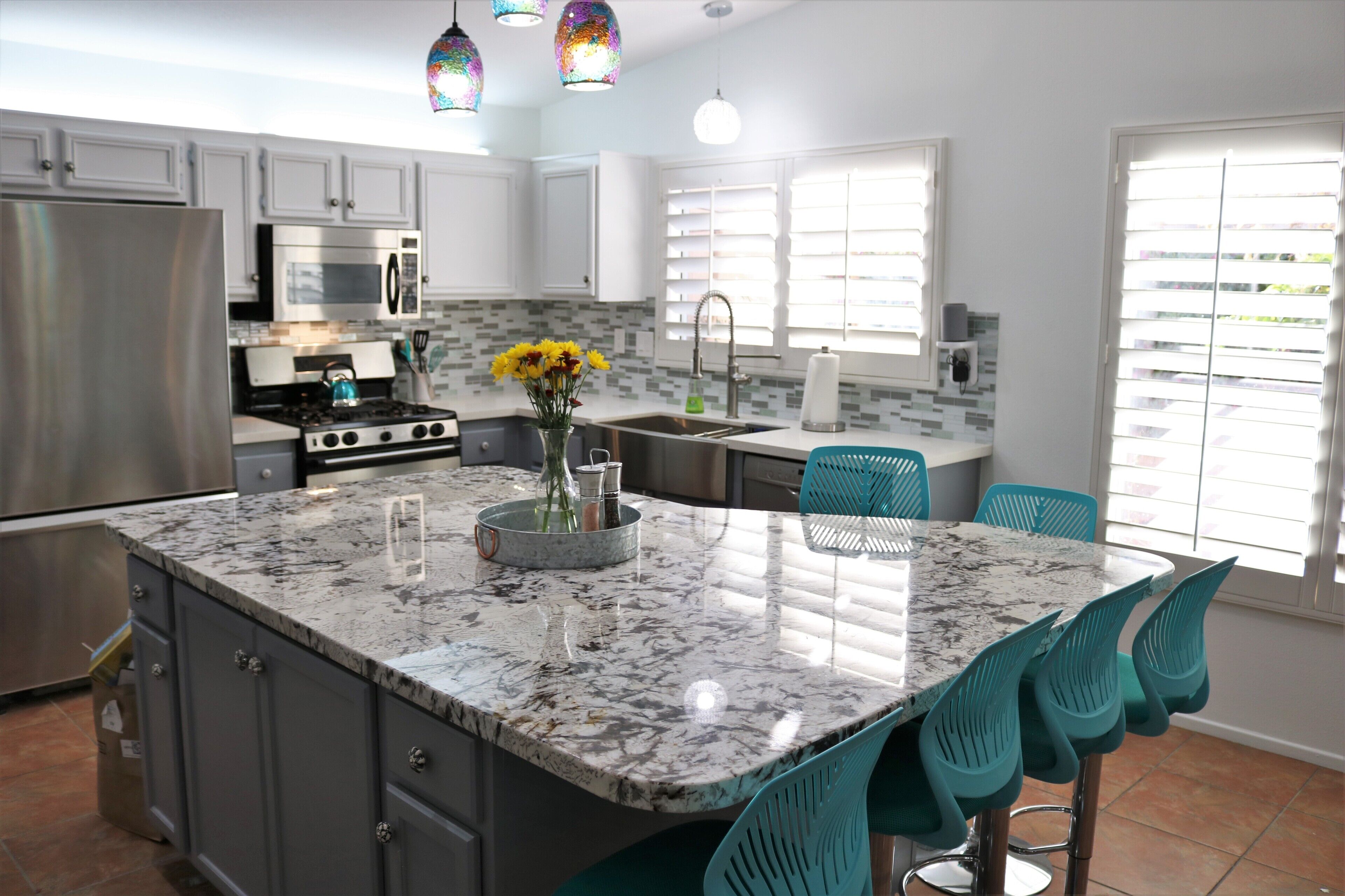 A beautifully remodeled kitchen with custom island and seating for 6.