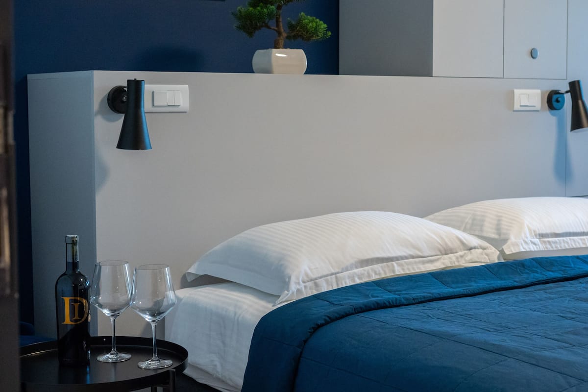 Economy Double or Twin Room | Minibar, in-room safe, desk, laptop workspace