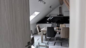 Apartment, 1 Bedroom, Kitchenette | Living area | Flat-screen TV
