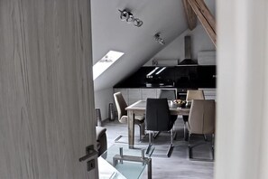 Apartment, 1 Bedroom, Kitchenette | Living area | Flat-screen TV