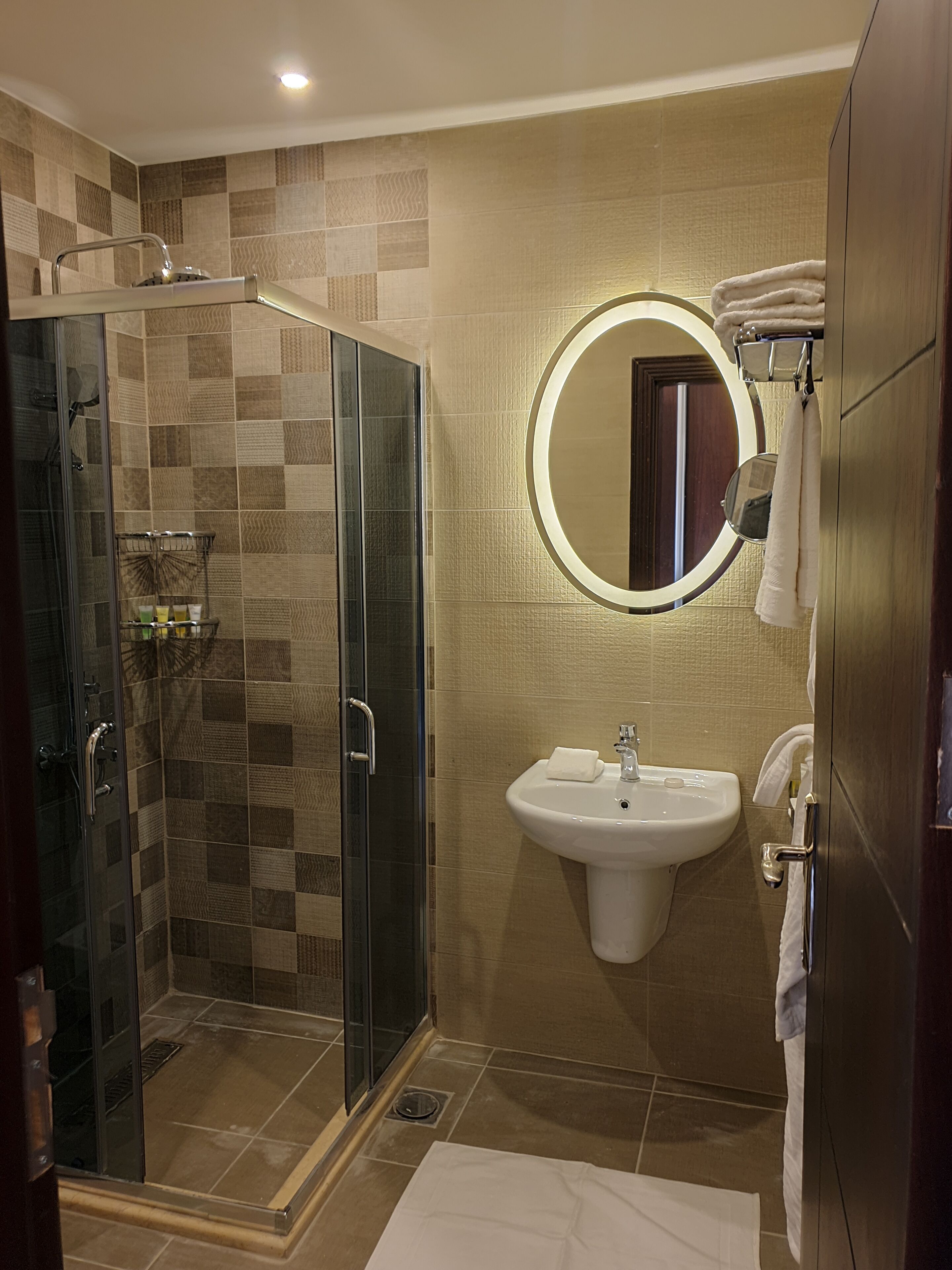 shower, bathrobes, slippers, bidet