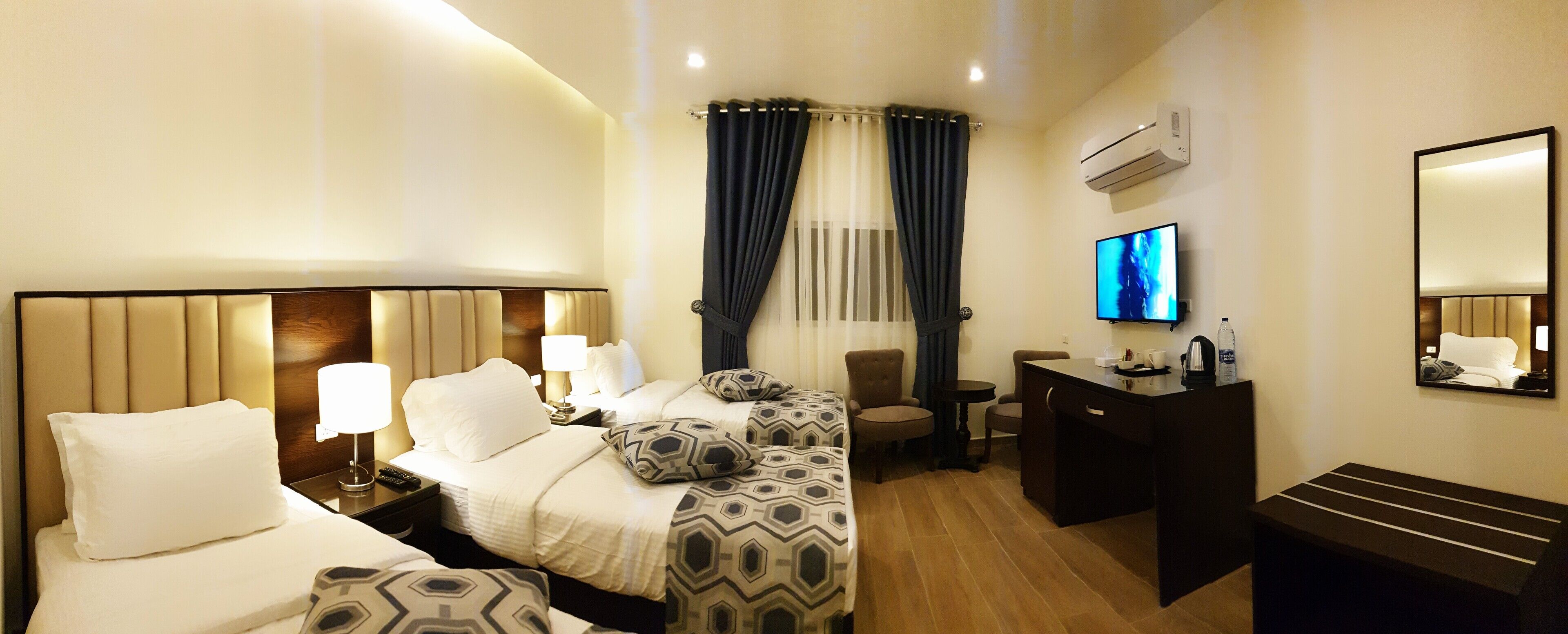 deluxe triple room | 1 bedroom, pillow-top beds, minibar, in-room safe
