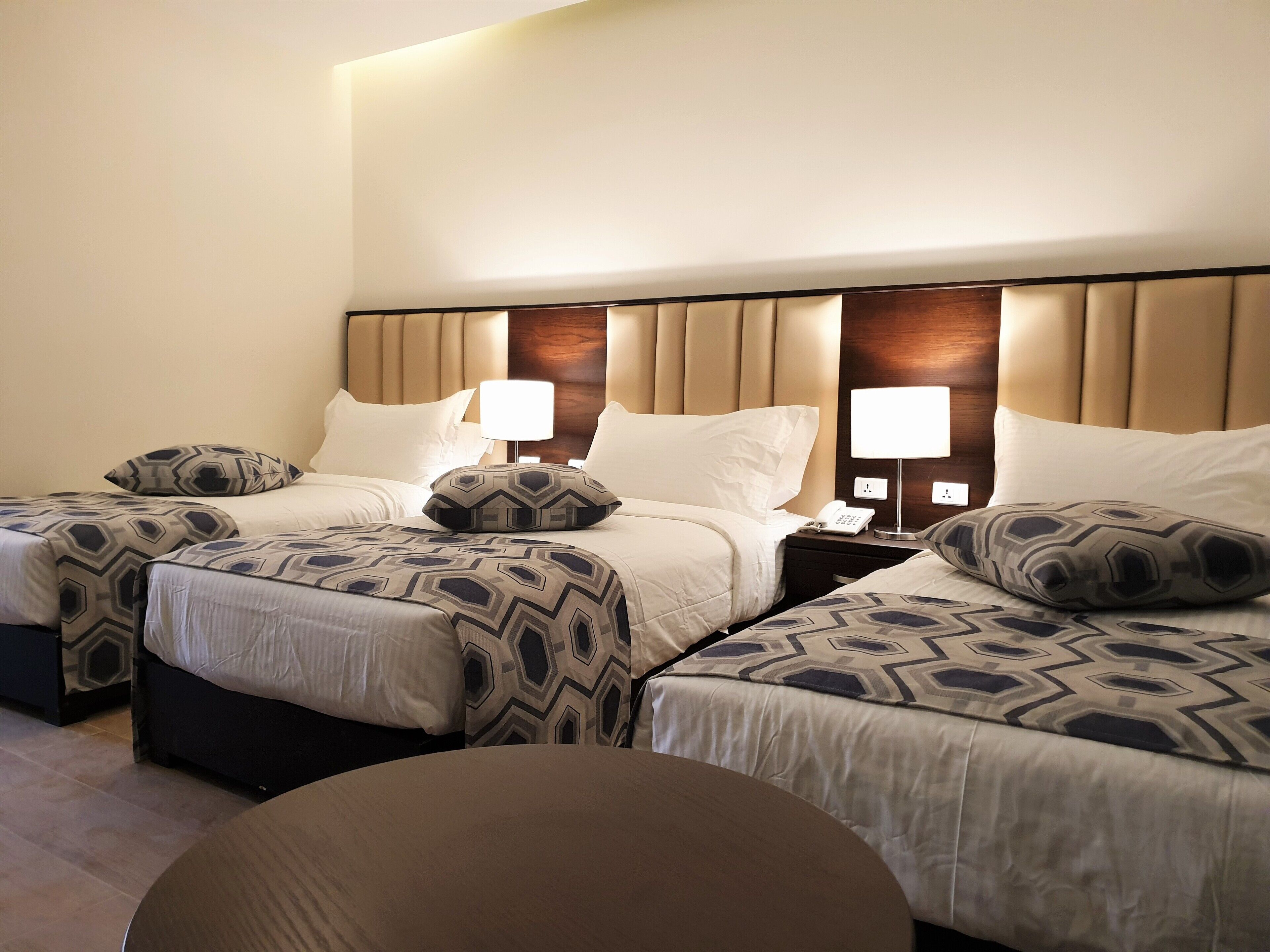 deluxe triple room | 1 bedroom, pillow-top beds, minibar, in-room safe