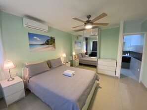 Deluxe Villa, Garden View, Executive Level | In-room safe, desk, laptop workspace, iron/ironing board - TrueCost Resort Villas Paradise (Punta Cana)
