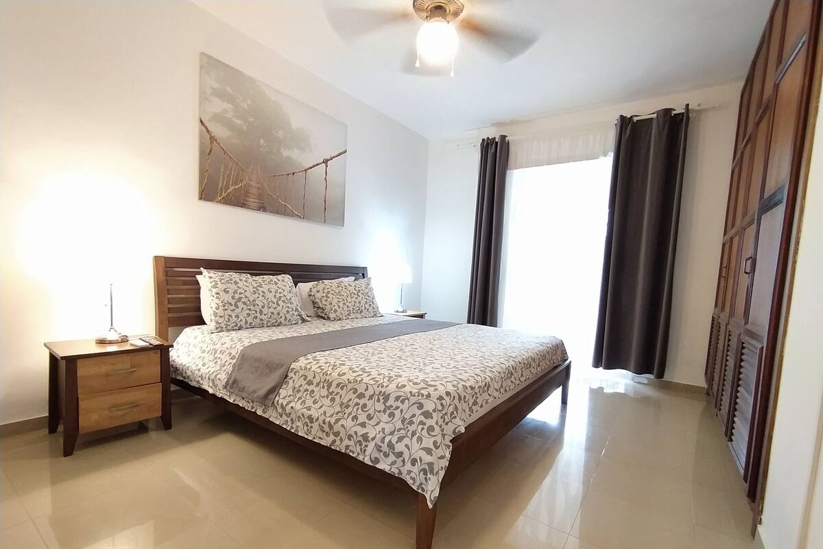 Deluxe House, 2 Bedrooms, Pool View, Beachfront | In-room safe, desk, laptop workspace, iron/ironing board