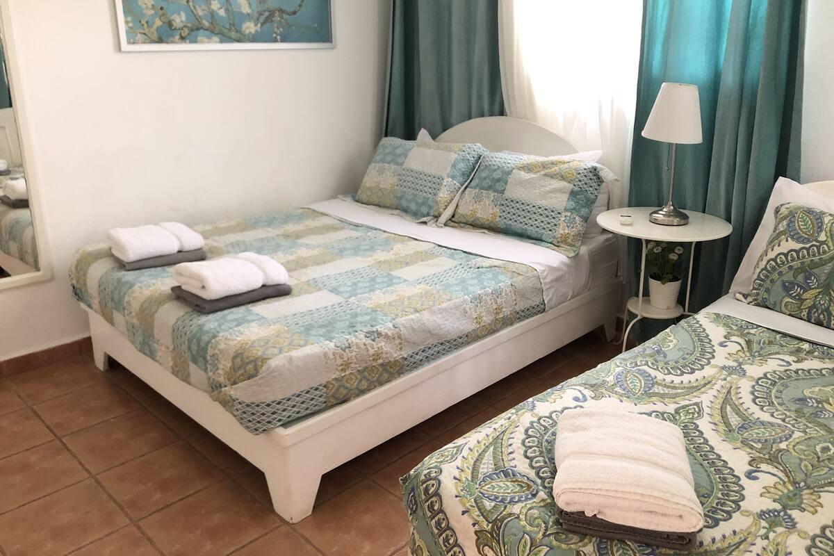 Executive Villa, 2 Bedrooms, Garden View, Garden Area | In-room safe, desk, laptop workspace, iron/ironing board