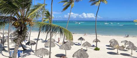 Beach nearby, white sand, sun loungers, beach umbrellas